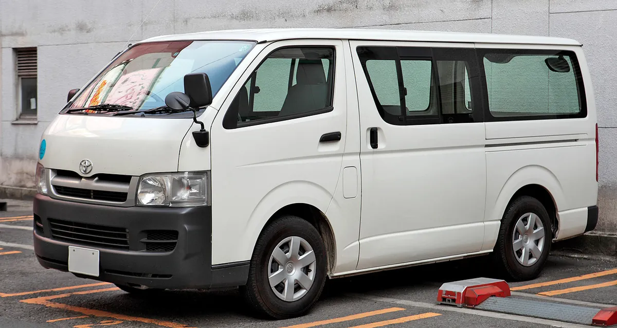 Representative standard-roof Toyota Hiace for the 11-seater service