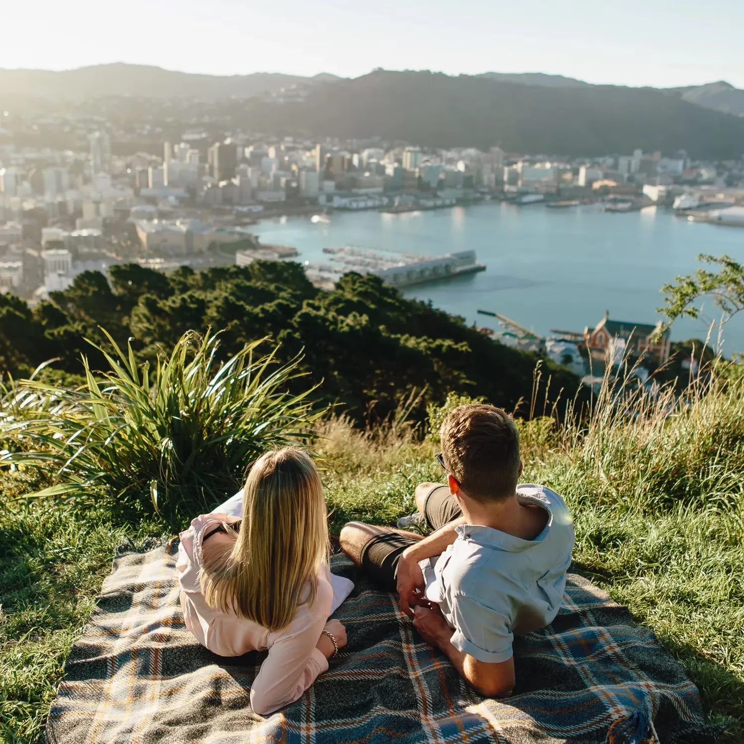 Two visitors enjoying the view over Wellington from Mount Victoria